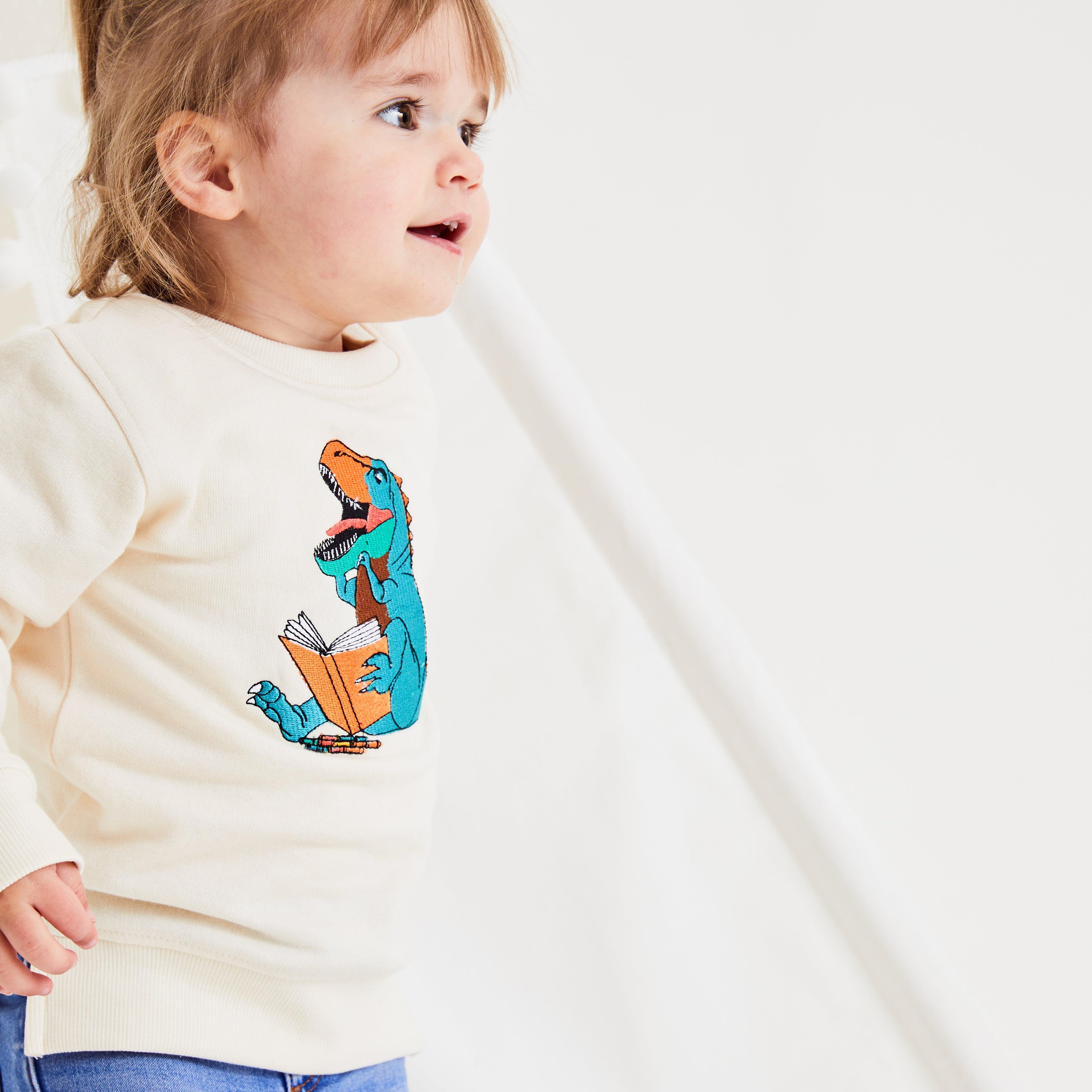 Unisex Cream Reading T-Rex - Cocoon Baby